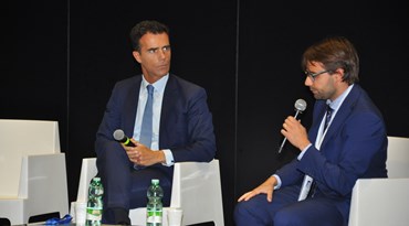 Forum PA Il Sottosegretario Sandro Gozi con Roberto Vicaretti di Rainews24